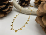 Load image into Gallery viewer, Waterproof minimalistic layering necklace with little circles available in gold and silver.

