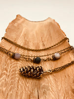 Load image into Gallery viewer, Bronze Boreal Pinecone Pendant Necklace with Natural Stones
