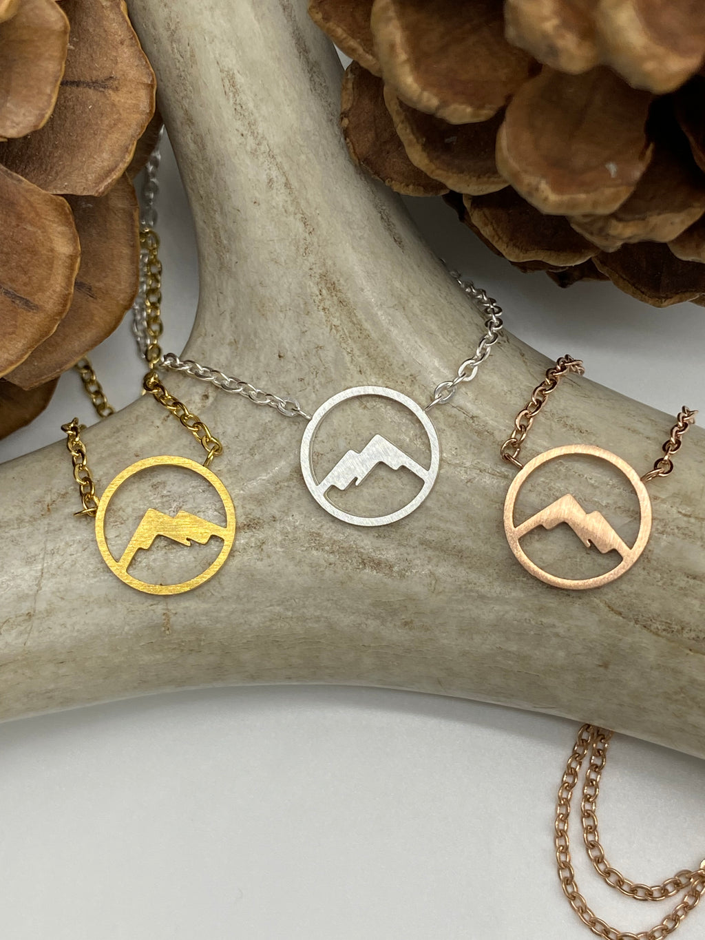 Adjustable mini circle mountain necklace made from waterproof stainless steel, available in gold, silver, rose gold.  