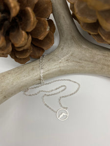 Adjustable mini circle mountain necklace made from waterproof stainless steel, available in gold, silver, rose gold.