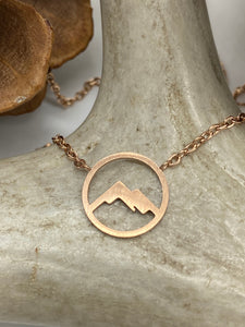 Adjustable mini circle mountain necklace made from waterproof stainless steel, available in gold, silver, rose gold.